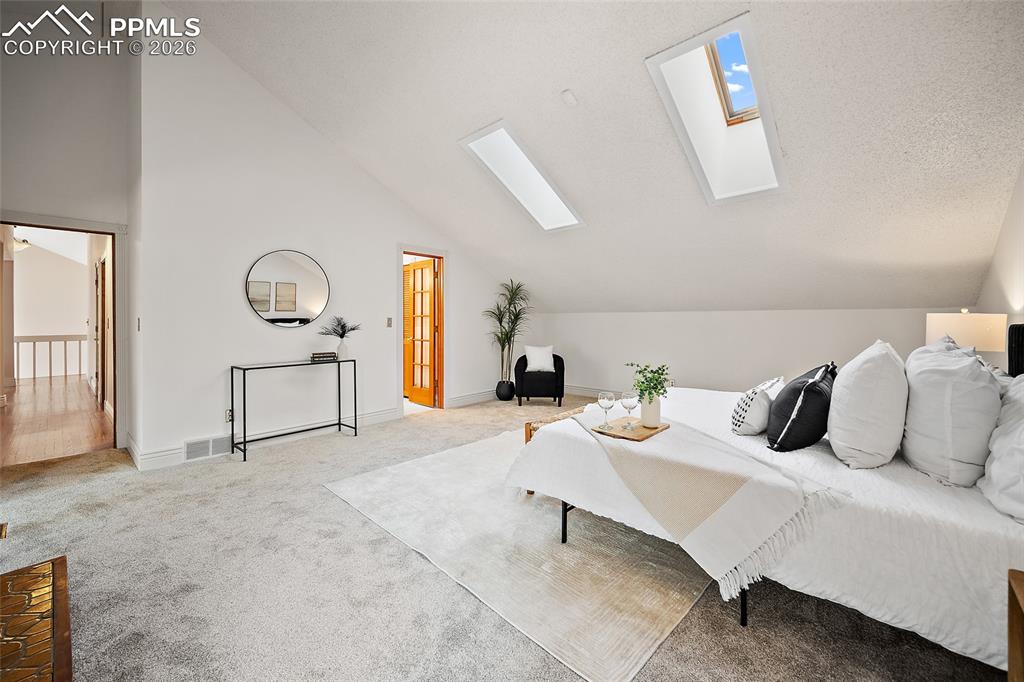 Image 25 of 50: Master Bedroom