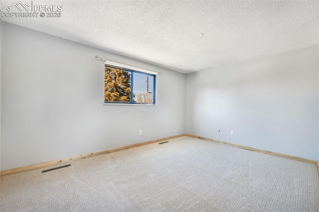 Image 12 of 50: Master Bedroom