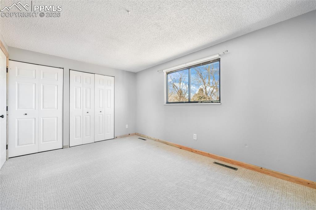 Image 13 of 50: Master Bedroom