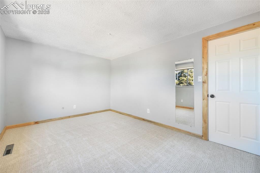 Image 15 of 50: Master Bedroom