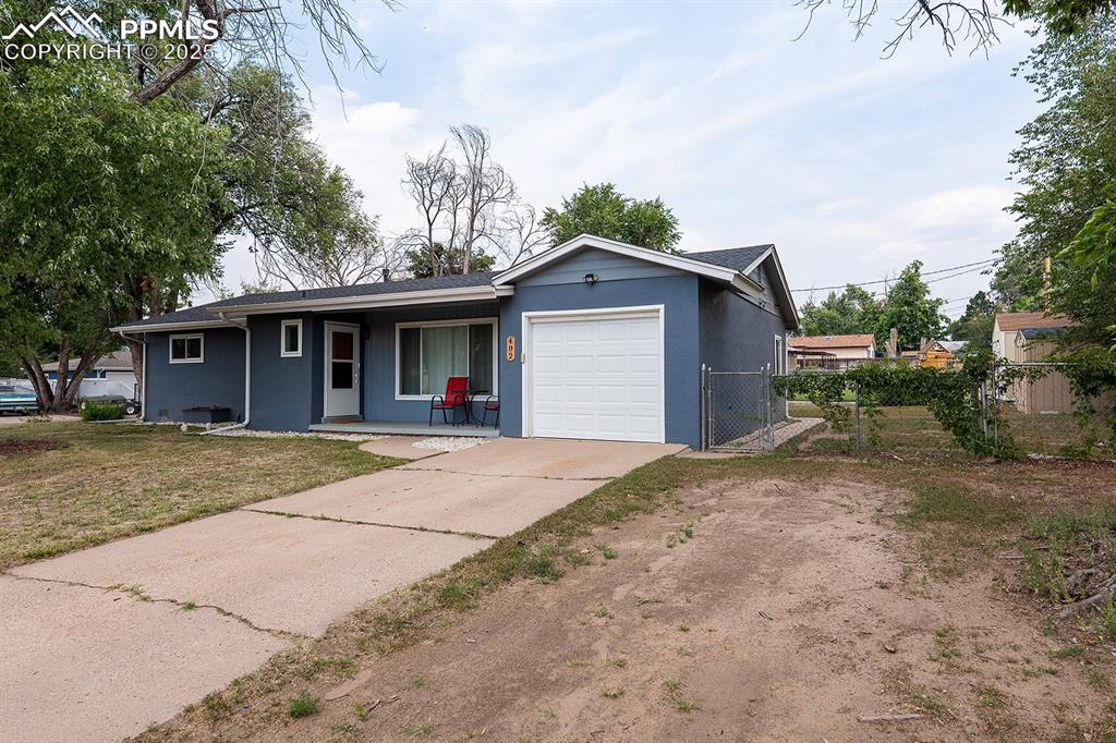 Image 2 of 43: Room for an RV or extra autos. Perhaps add a garage.