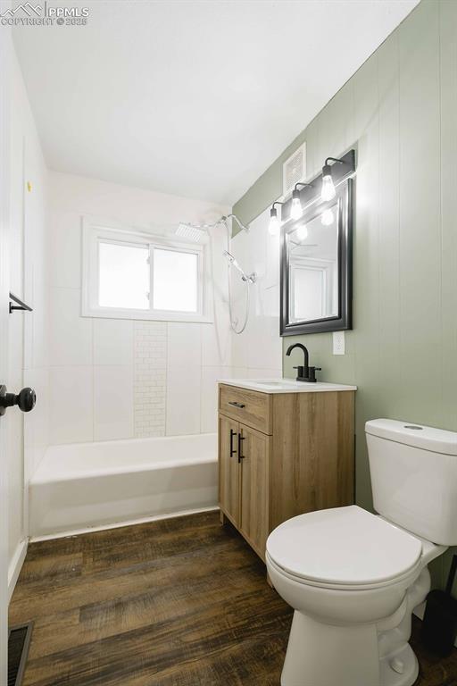 Image 21 of 43: Updated bathroom with new tile work.