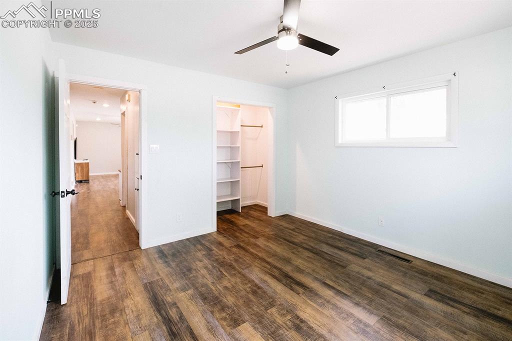 Image 23 of 43: Good size bedroom. All newer LVP flooring through out the homes.