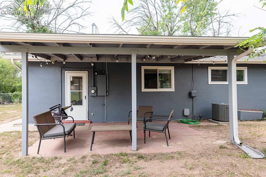 Image 43 of 43: Covered patio area.