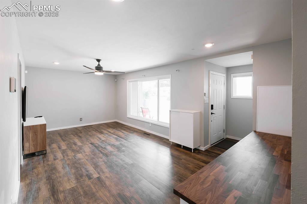 Image 6 of 43: Entry and living space.