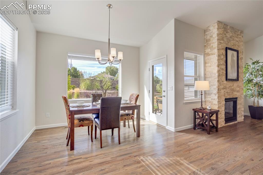 Image 12 of 50: unlit dining with easy patio access