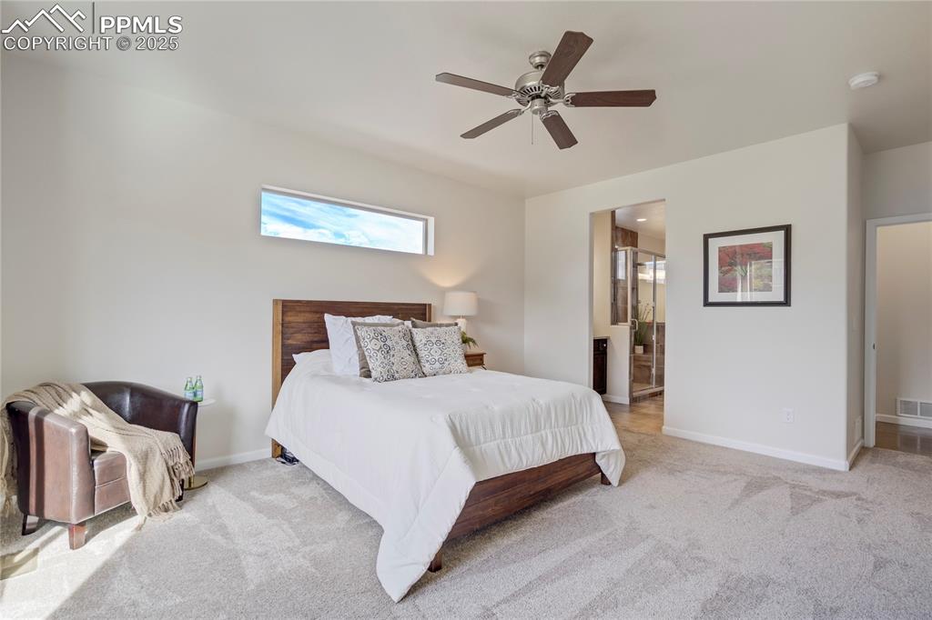 Image 16 of 50: Master Bedroom