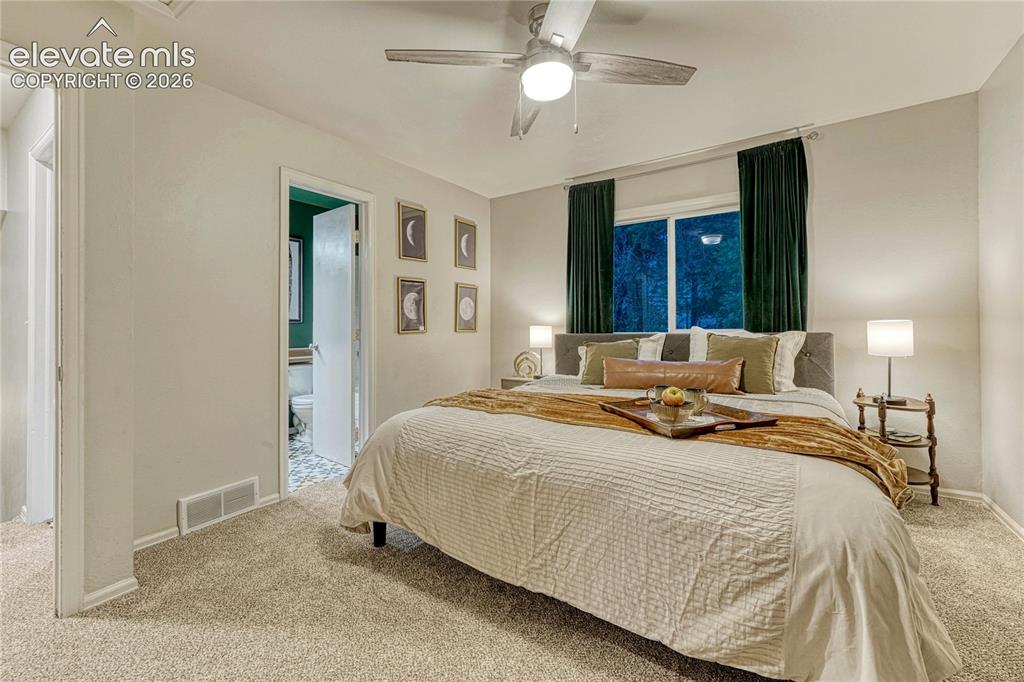Image 16 of 50: Master Bedroom