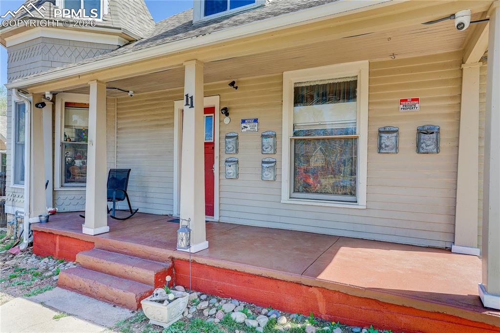 Image 2 of 11: Covered front porch