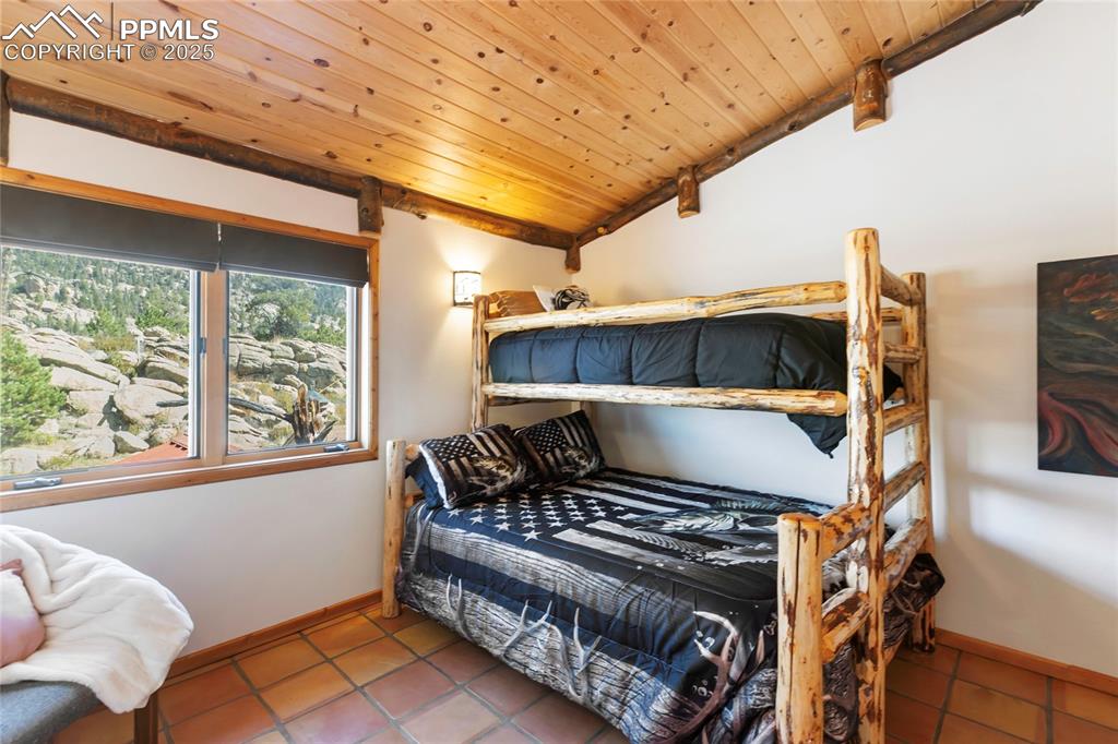 Image 24 of 48: 3rd bedroom - upper level - bunk bed will stay with the house