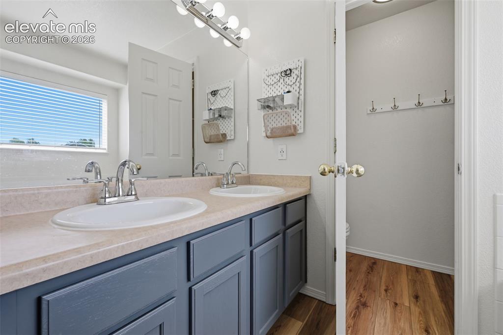 Image 22 of 43: primary bath with soaking tub and separate shower