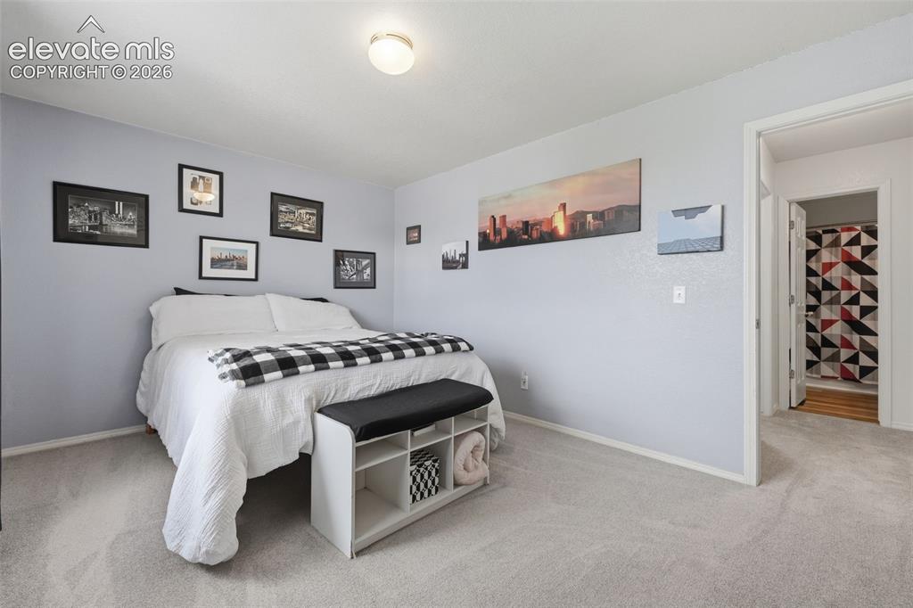Image 23 of 43: secondary upstairs bedroom