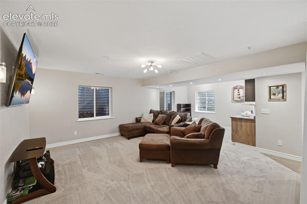 Image 31 of 43: Basement living area