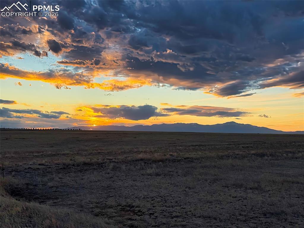 Image 11 of 15: Mountain & Sunset Views – Stunning western-facing views with mountain silho
