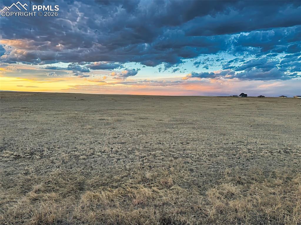 Image 13 of 15: Open Acreage Setting – Broad, unobstructed views across the plains with dra