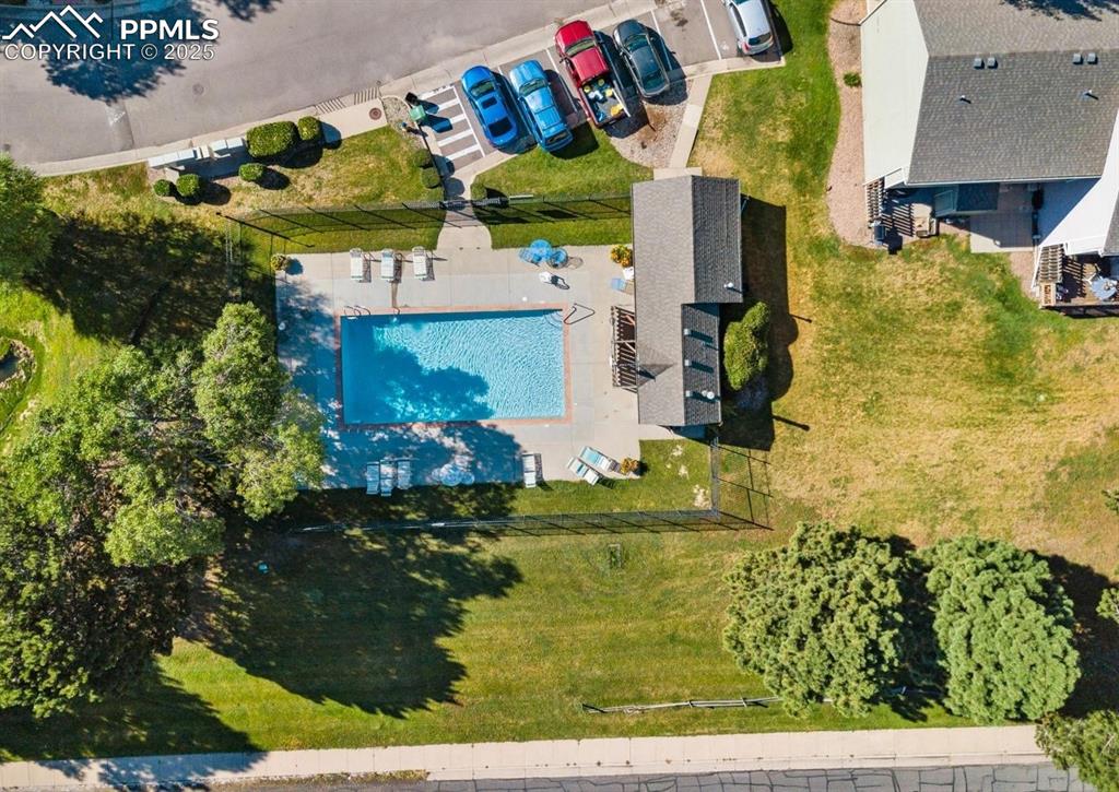 Image 24 of 27: Aerial view of a pool