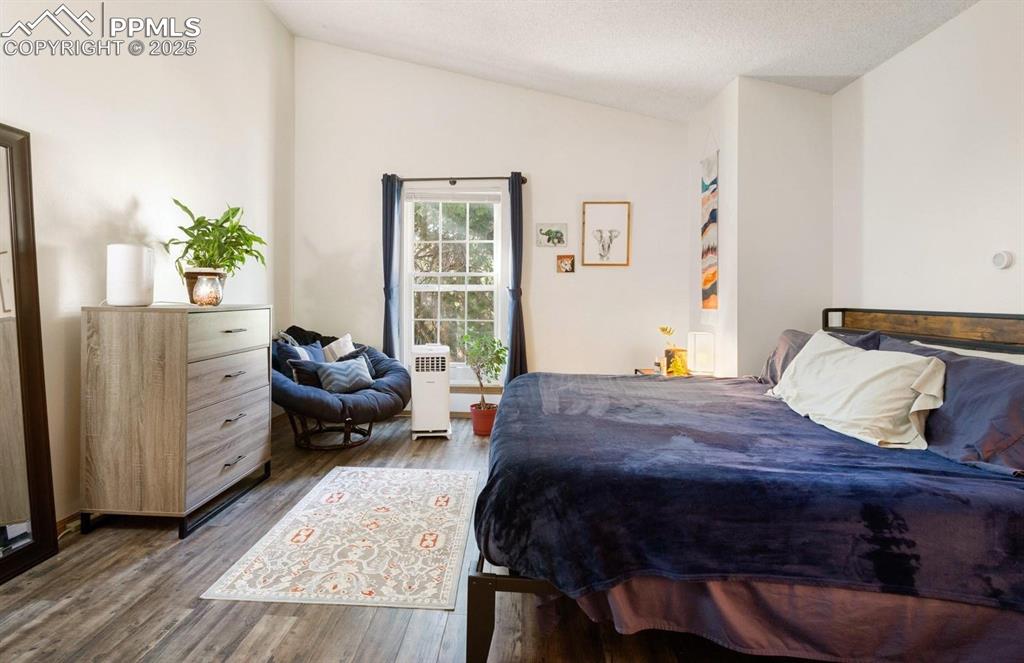 Image 8 of 27: Primary Bedroom featuring LVP flooring