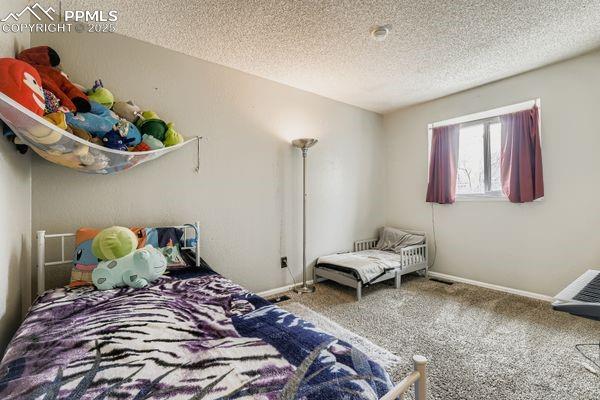 Image 20 of 27: Bedroom