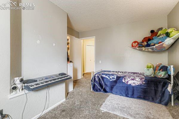 Image 22 of 27: Bedroom