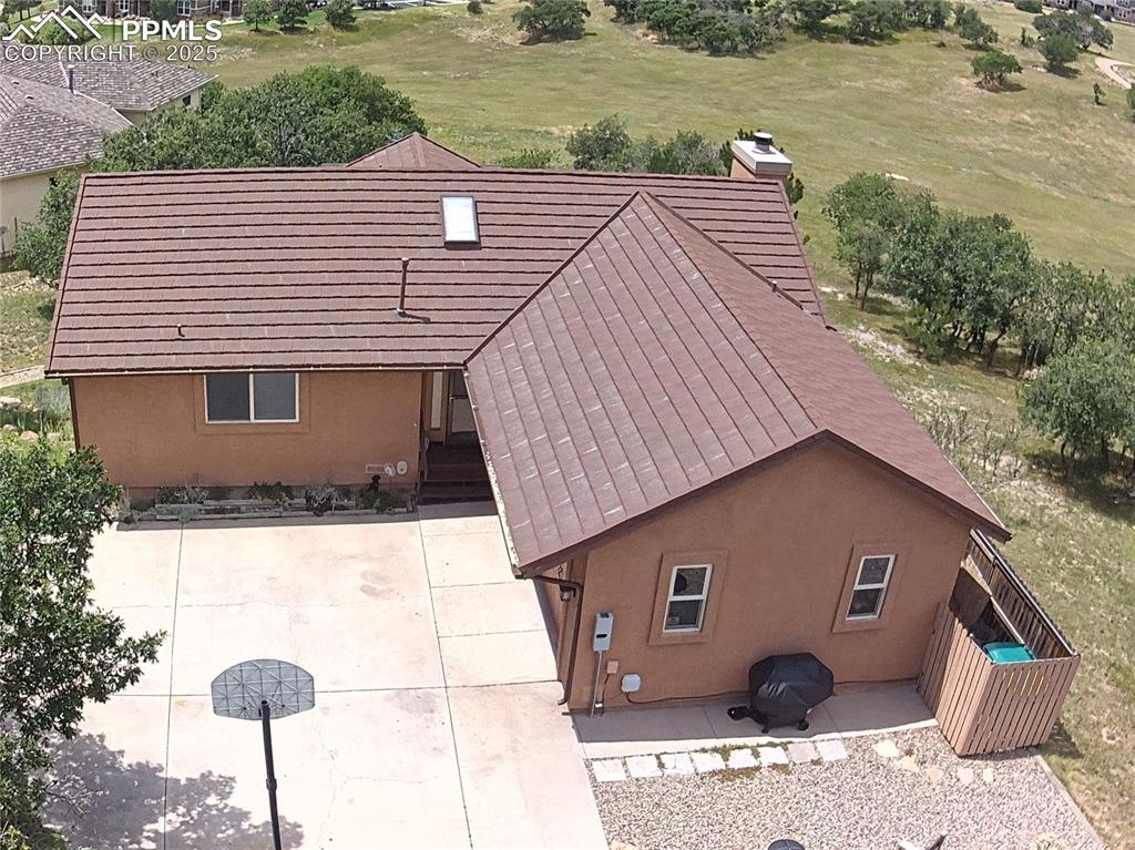 Image 11 of 48: With a CONCRETE TILE roof system
