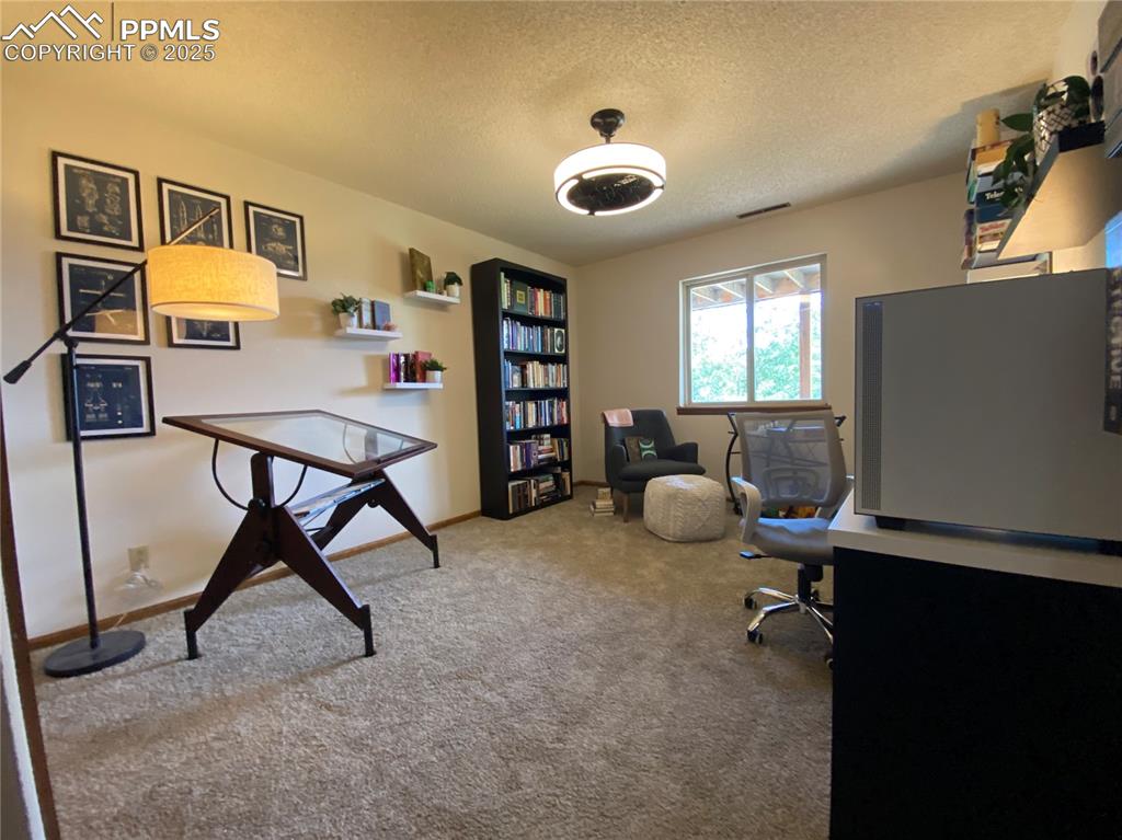 Image 37 of 48: Bedroom #2 works great as an Office or gaming room