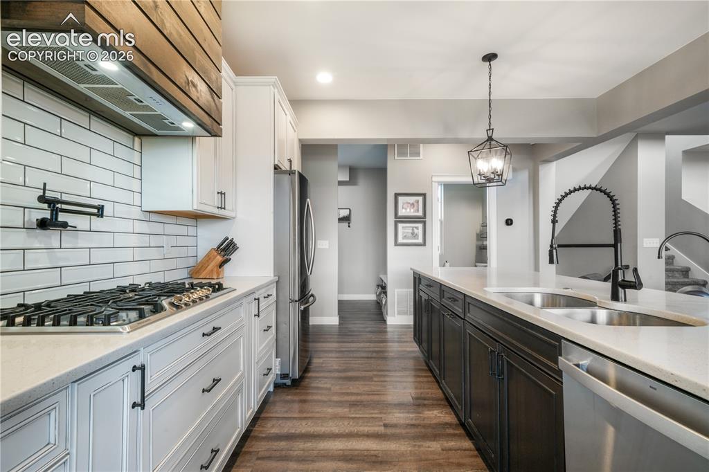 Image 15 of 50: Expansive kitchen island and additional storage