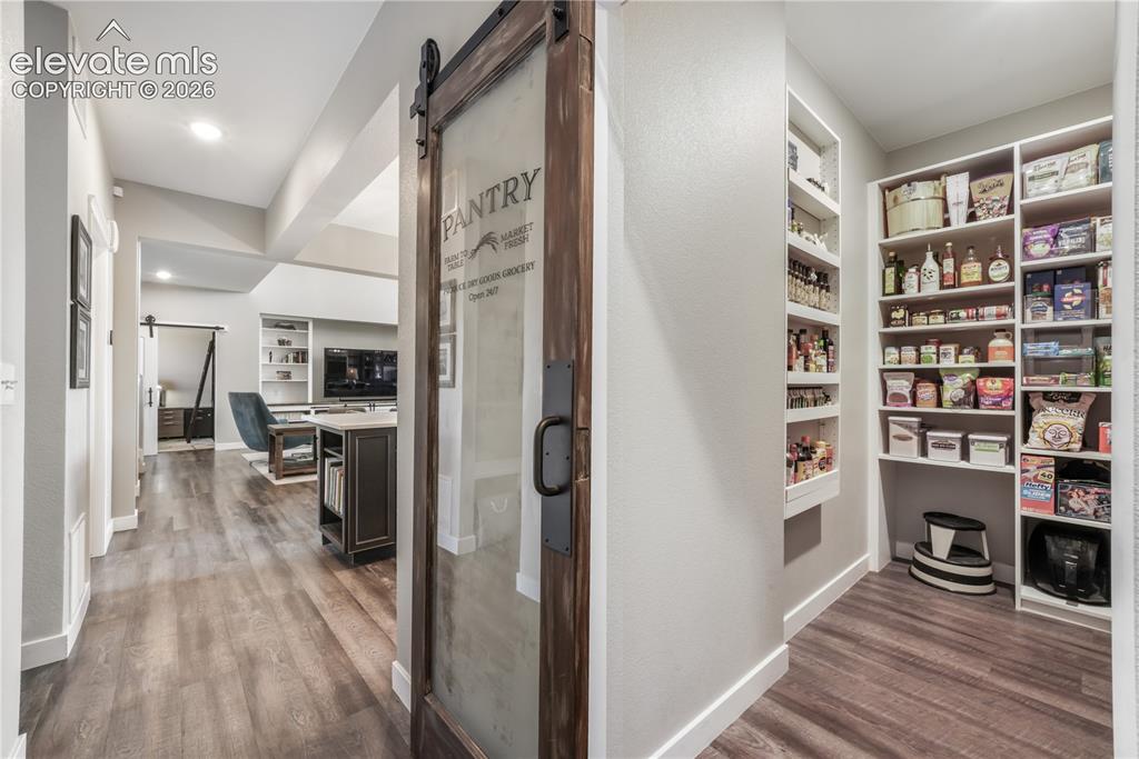 Image 16 of 50: Dining area with access to covered back deck