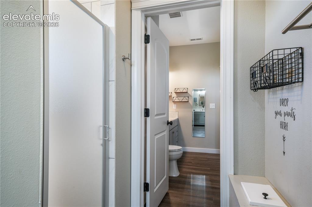 Image 35 of 50: Main level secondary suite bathroom