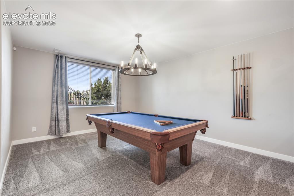 Image 44 of 50: Large finished walkout basement.