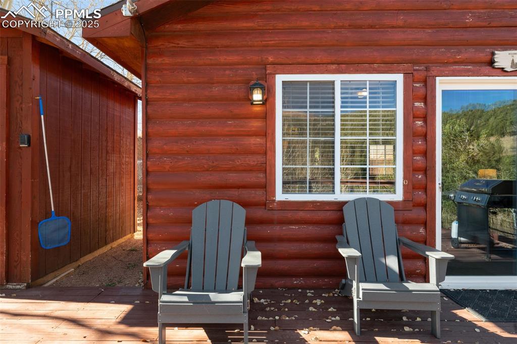 Image 26 of 34: View of patio / terrace with grilling area
