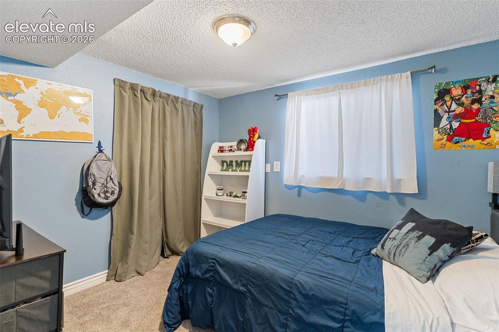 Image 18 of 36: Bedroom