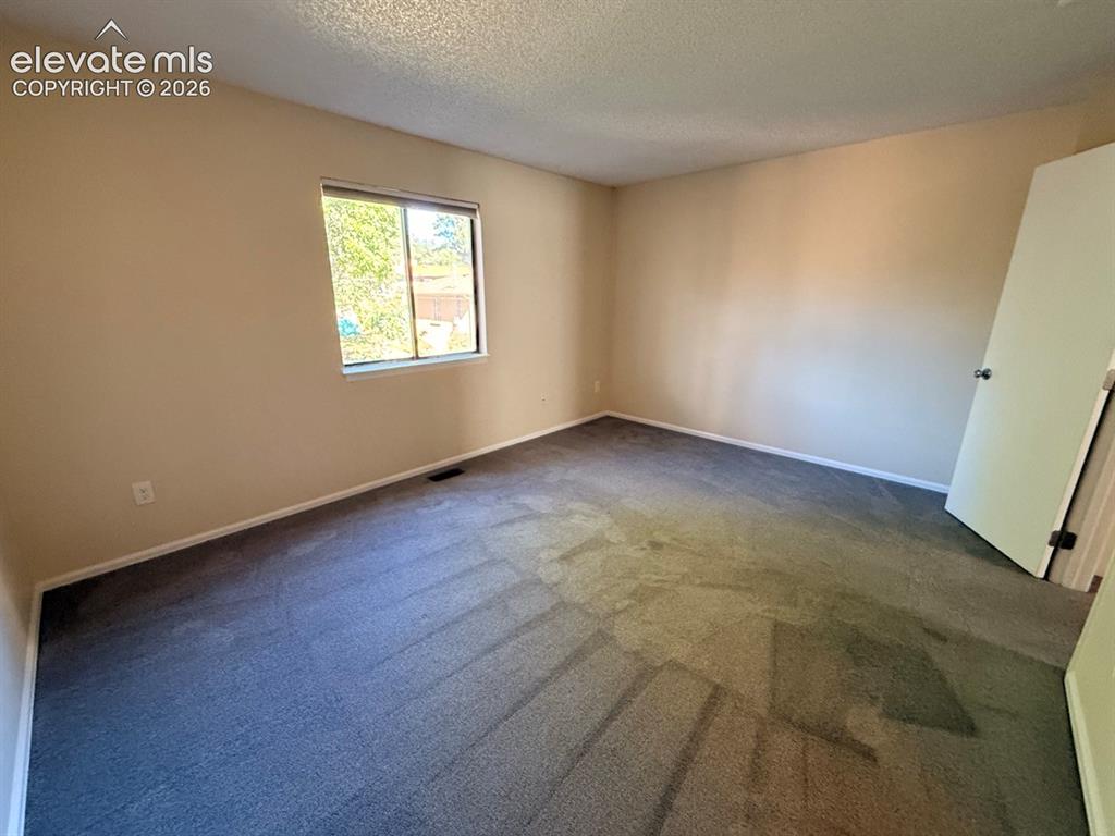 Image 18 of 23: Master Bedroom