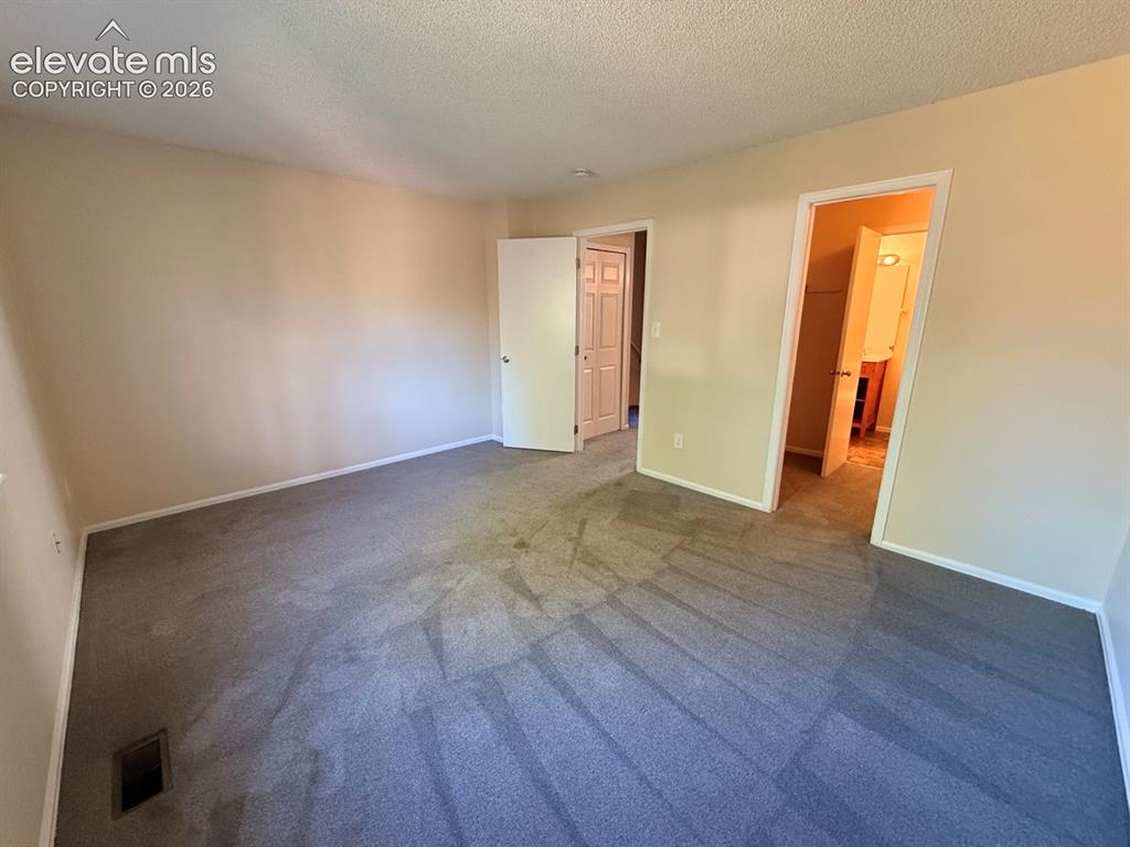 Image 24 of 30: Master Bedroom