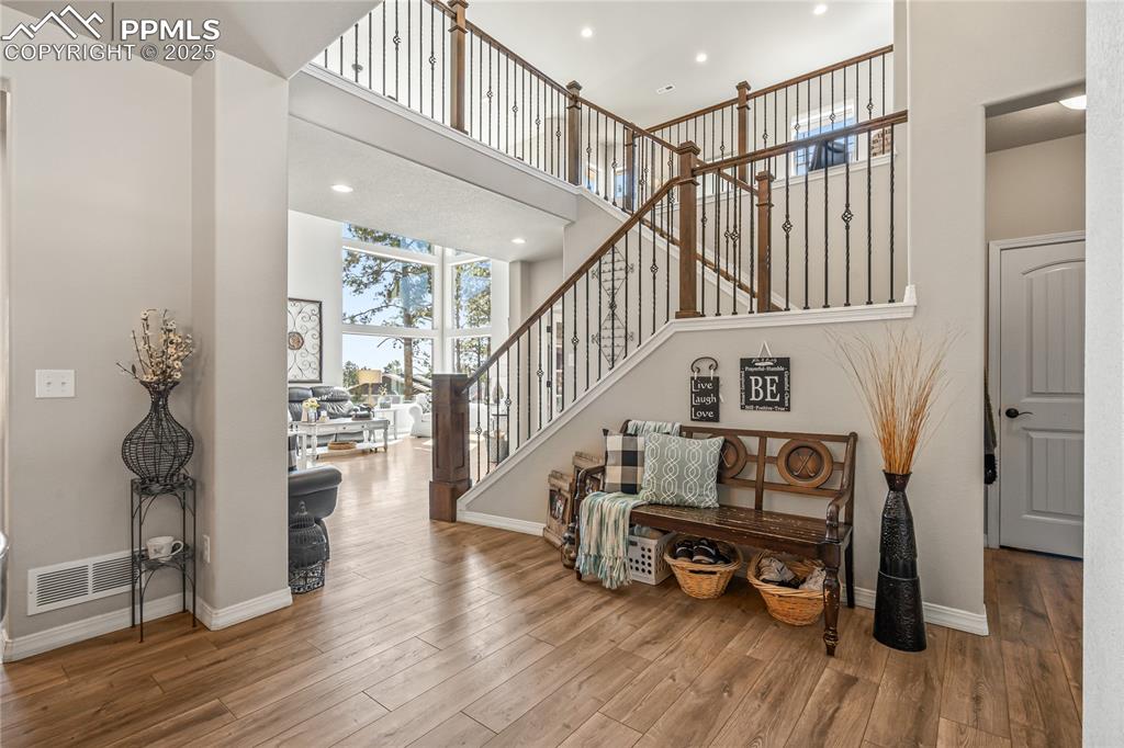 Image 3 of 46: 2-Story Entryway