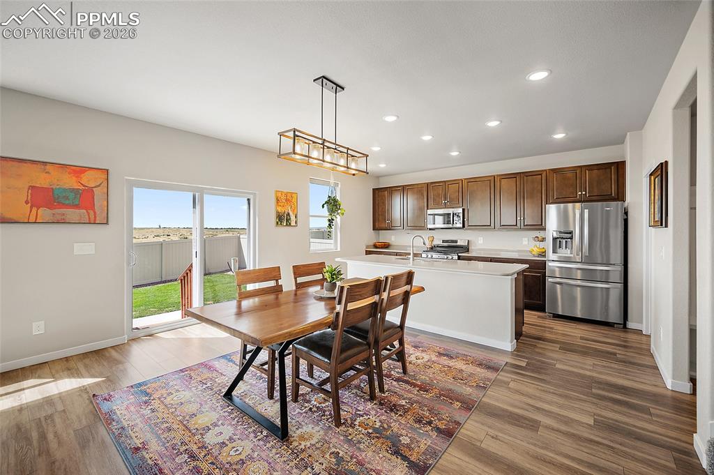 Image 10 of 41: Dining room with view of open space