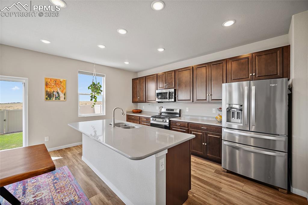Image 13 of 41: Open concept kitchen with with high end appliances