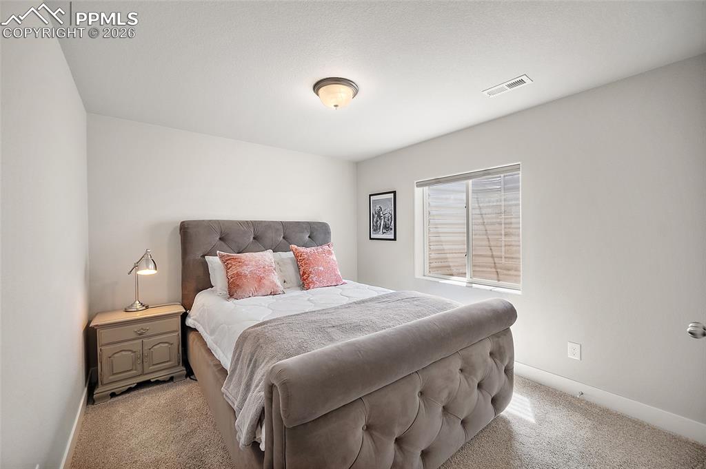 Image 31 of 41: Fourth bedroom in private basement area