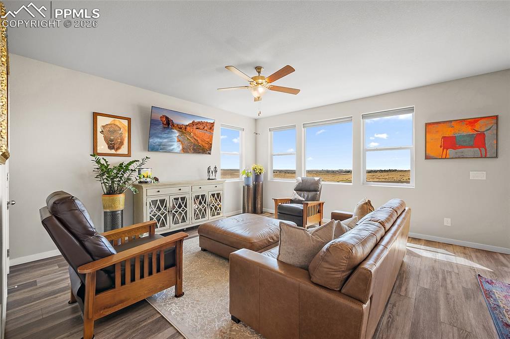 Image 8 of 41: Living room with views of beautiful open space
