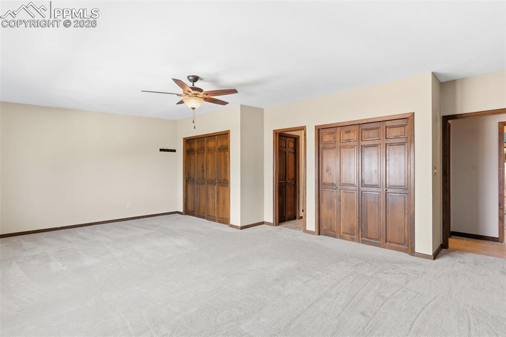 Image 20 of 35: Primary suite has 2 closets, and more space than you