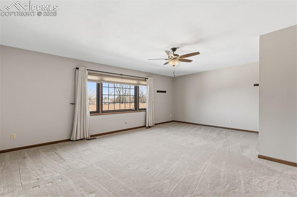 Image 5 of 35: Oversized Master bedroom with space for a bedroom and private sitting area
