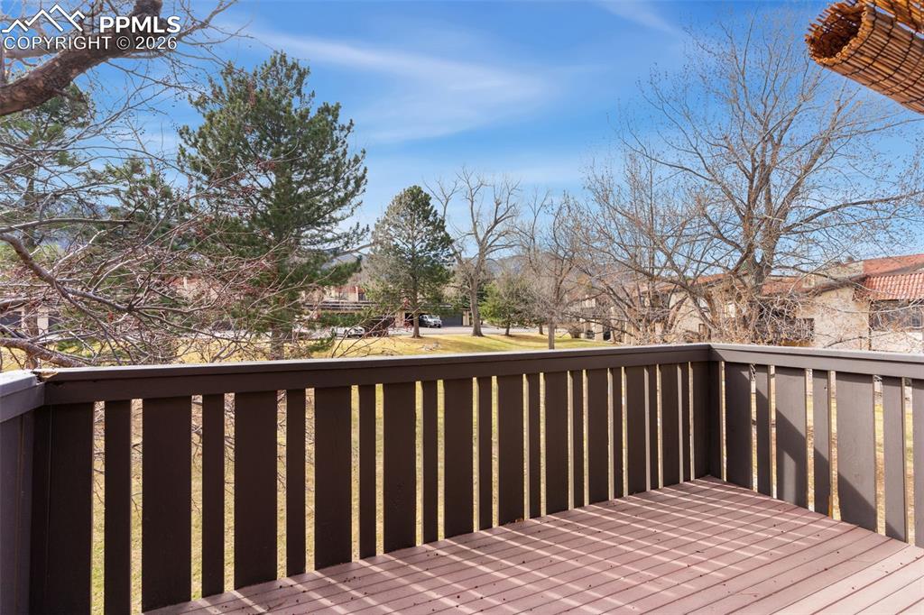 Image 7 of 35: Deck overlooks the open space of Villa Pourtalles, has lots of afternoon su