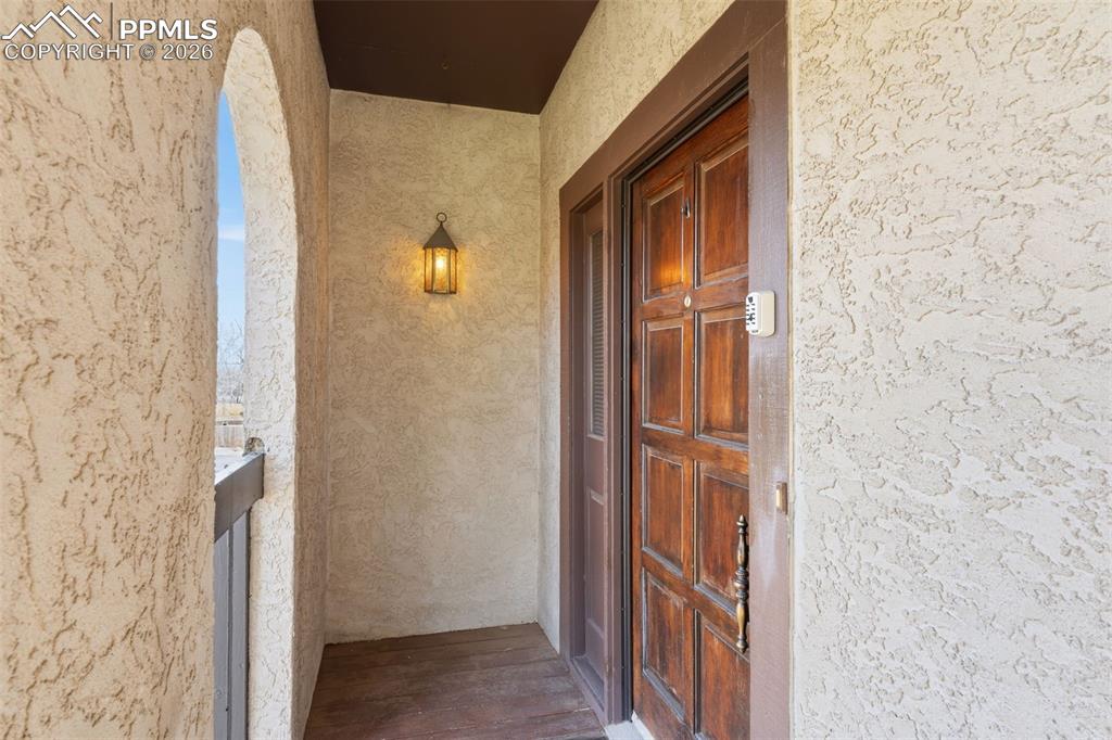 Image 9 of 35: Private, covered entry