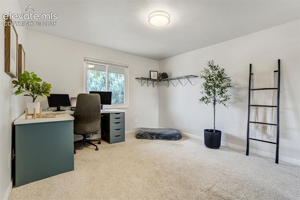 Image 17 of 44: Bedroom 2 currently being used as an office. 
