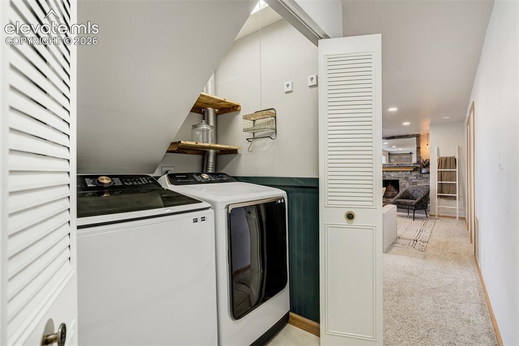 Image 30 of 44: Even the laundry space is cute. 