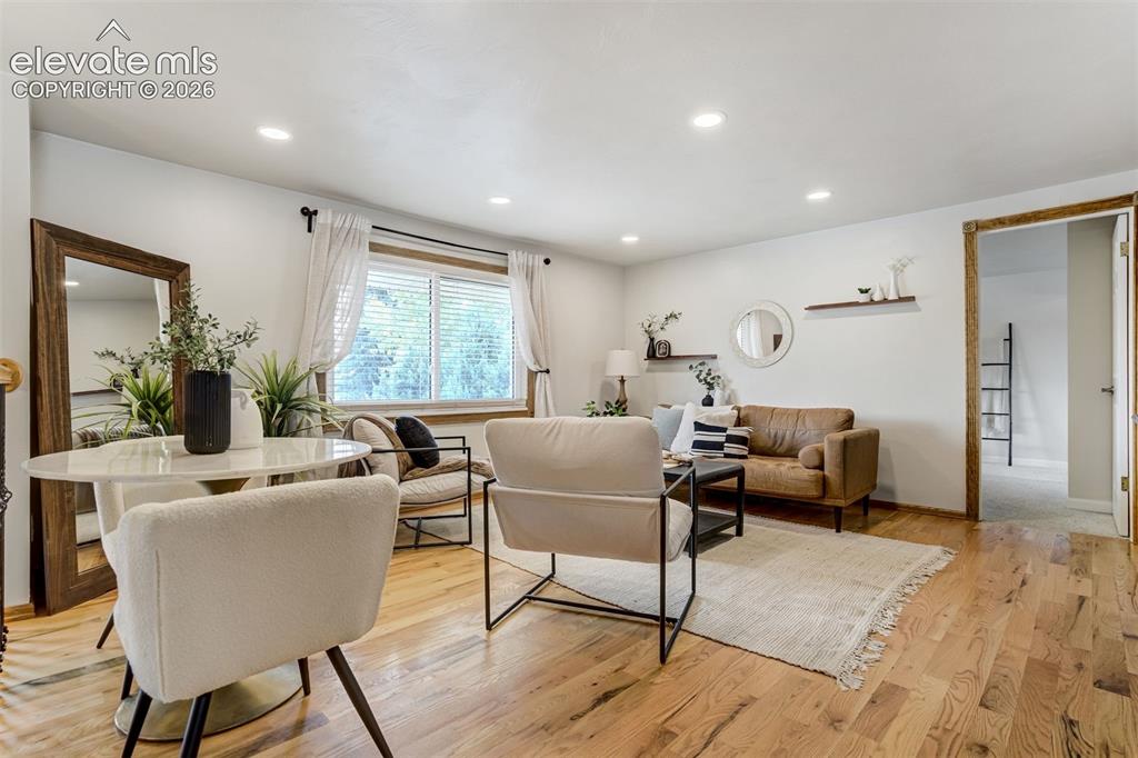 Image 5 of 44: Oakwood floors & recessed lighting. 