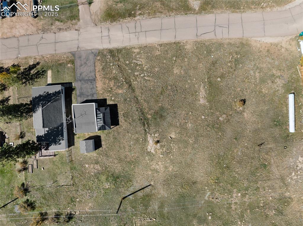 Image 46 of 49: Aerial view of property and surrounding area