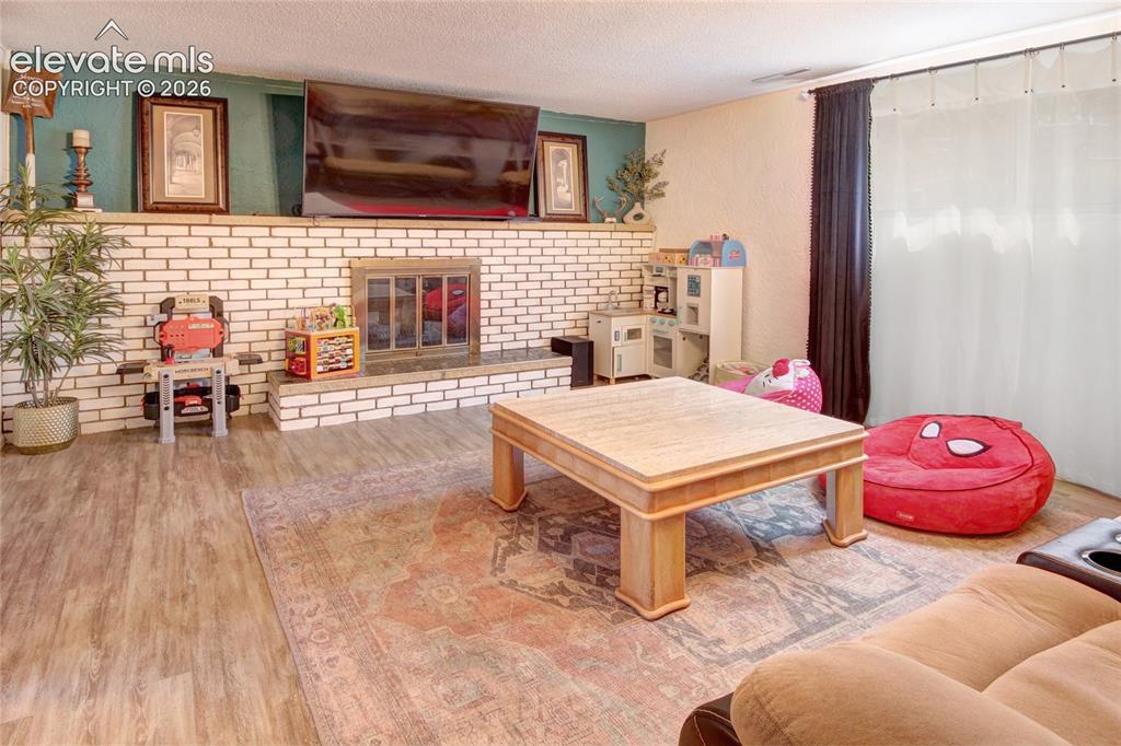 Image 27 of 43: Family room in lower level