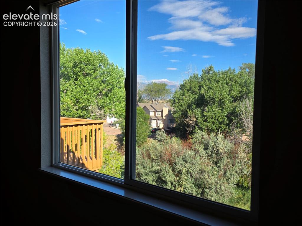 Image 18 of 41: Seller provided photo of view of Pikes Peak from primary bedroom