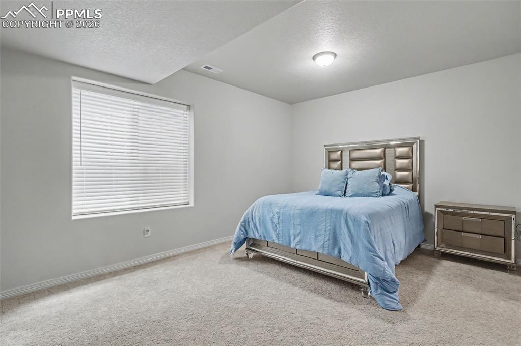 Image 36 of 38: Bedroom