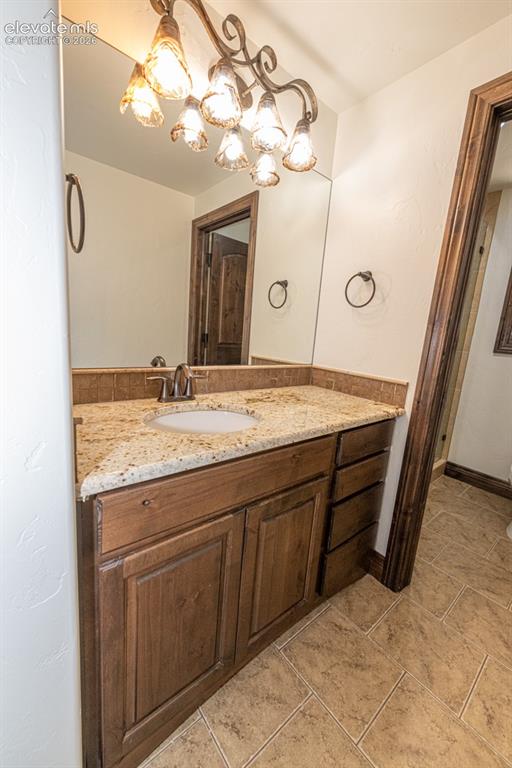 Image 36 of 50: Basement bath that services rec area